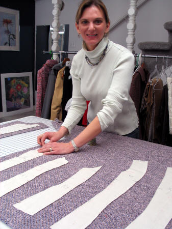 Cutting out the couture jacket.