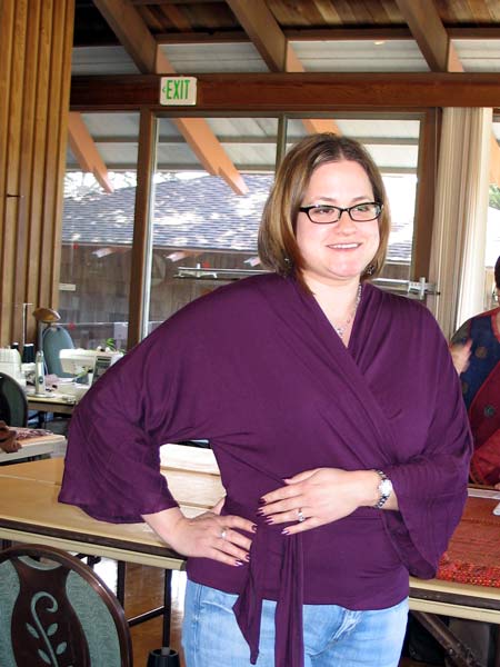 Carries sews a purple top